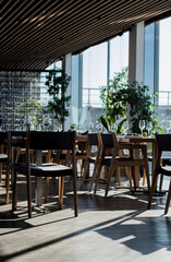 Interior of a modern cafe with daylight.