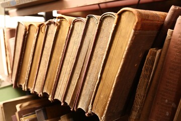 Collection of old books in library, closeup