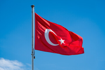 Turkish flag in front of a blue sky