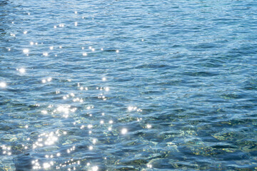 ocean water surface sunlight reflections like stars
