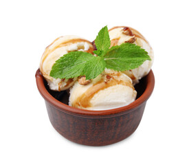 Tasty ice cream with caramel sauce, mint and nuts in bowl isolated on white