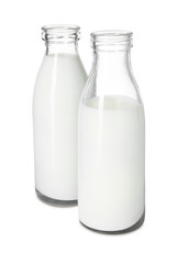 Bottles of tasty milk isolated on white