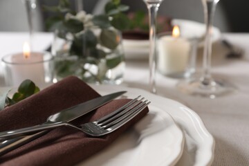 Beautiful table setting with floral decor, closeup. Space for text