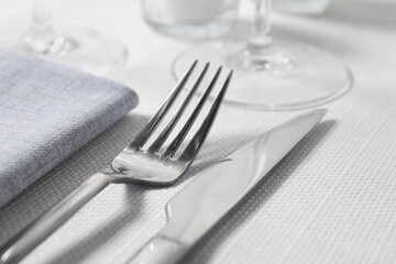 Beautiful table setting with silverware, closeup view