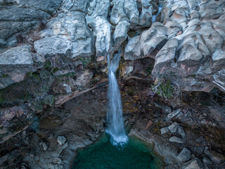 45-Degree Aerial Drone Shot of El Salt de La Portellada Waterfall, Teruel, Spain