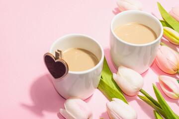 Valentine's Day romantic concept. Morning coffee, a bouquet of tulips, symbolic decor