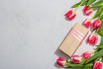 Zero waste spring gift concept. Pink tulips, surprise box for Anniversary, Mothers or Valentines Day