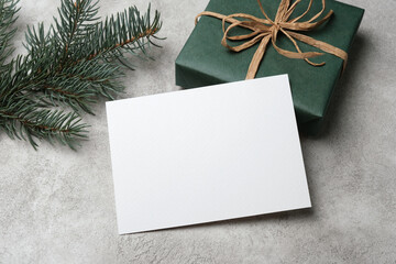 Fototapeta na wymiar White paper Christmas holidays card mockup with copy space for text or card design