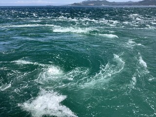 The Naruto whirlpools called Uzushio are tidal whirlpools in the Naruto Strait.
