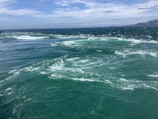 The Naruto whirlpools called Uzushio are tidal whirlpools in the Naruto Strait.
