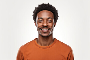 Head shot of african american smiling man wearing t-shirt, looking at camera
