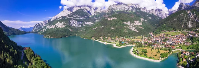 Gardinen Most scenic mountain lakes in northern Italy - beautiful Molveno in Trento, Trentino Alto Adige region. panoramic aerial drone high angle view. © Freesurf