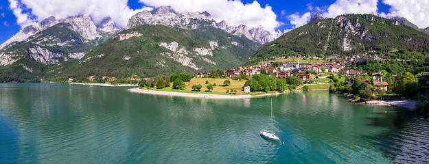 Gardinen Most scenic mountain lakes in northern Italy - beautiful Molveno in Trento, Trentino Alto Adige region. aerial drone high angle view. © Freesurf