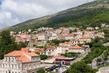 Fototapeta na wymiar Dubrovnik, Croatia - August 03,2023: View at famous travel destination city of Dubrovnik, Dalmatia, Croatia, Europe. Old town of Dubrovnik