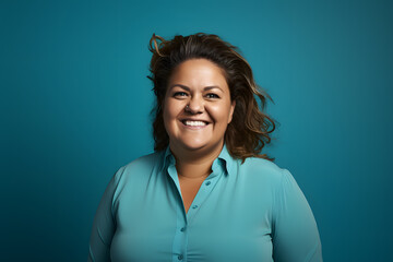 Slightly overweight businesswoman smiling confidently. Bold and vibrant clean minimalist studio portrait, copy space.