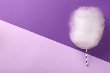 Foto op Plexiglas One sweet cotton candy on color background, top view. Space for text © New Africa