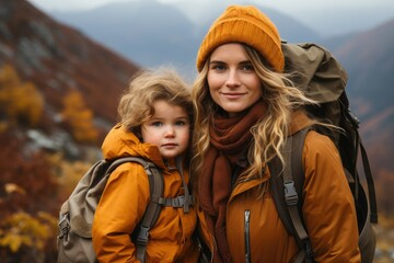 A mother with a child through the mountains. An active lifestyle.