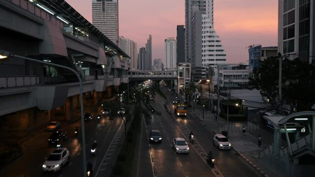 Bangkok street traffic at sunset 