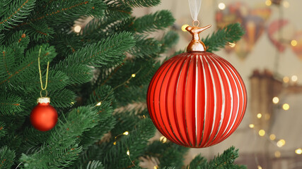 Christmas concept decorative red glass ball rotate on branch tree on background bokeh of side flickering light bulbs garlands for family holiday Happy New Year. Festival mood. Positive emotion. Noel