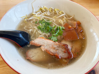 close up view of delicious asian cuisine, red pork noodle