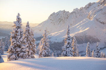 Amazing winter background. Snow covered mountains on the sunset in the Austrian Alps