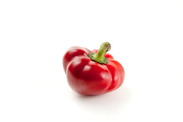 Whole red bell pepper isolated on white background with clipping path. .