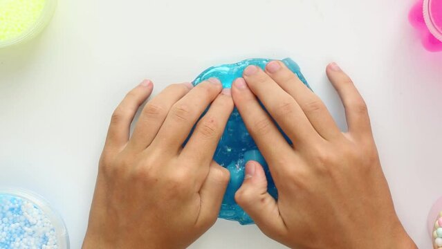 Yellow slime with pieces of cubes. Slime ASMR video.