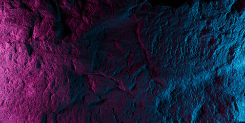 Black stone texture in pink blue neon lighting, dark abstract background. Natural mineral rock close up details, empty backdrop with copy space for design