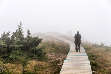 Clouds and fog over Gulf St. Lawrence from boardwalk Skyline Trail in Cape Breton Highlands National Park, Nova Scotia