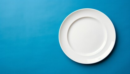 Top view empty round white plate on tablecloth for food on colored background. Empty dish on napkin...