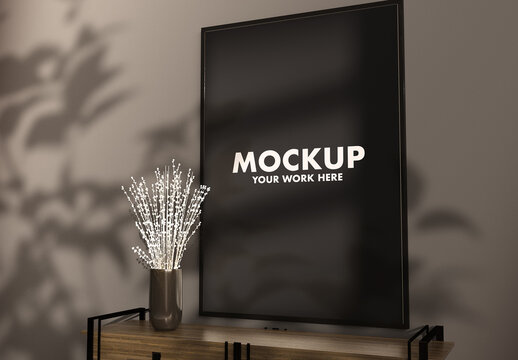 Simple Frame Mockup on a Clean Clean Grey Wall With White FLowers