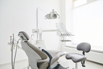 Dentist's office interior with modern chair and special dentisd equipment. Dentist office. Dentist...