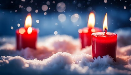 Red christmas candle and snow dark background