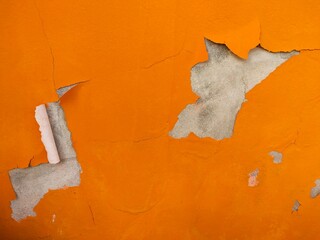 The old walls were painted a scuffed, chipped orange.