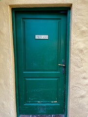 Green beautiful door in Tenerife, Spain. External wooden door. Privado main private