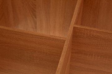 Wooden product. Closet shelves and partitions. Light oak furniture. Photo in minimalist style.