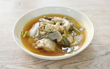 boiled hot and spicy soup with pork entrails on plate