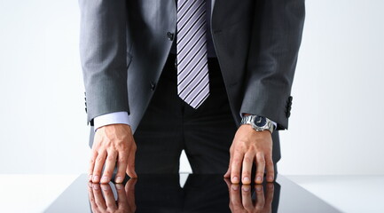 Empty arms of man in suit and tie closeup. White collar banker time watch wristwatch patience make...