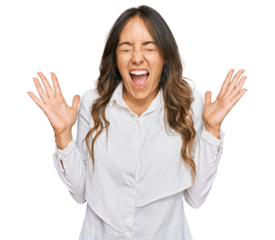 Young brunette woman wearing casual clothes celebrating mad and crazy for success with arms raised and closed eyes screaming excited. winner concept