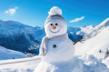 Obraz premium snowman in mountains with blue sky