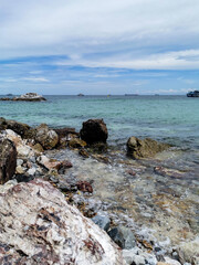 beautiful landscape view of Koh Larn island focus on rocks and sea, Chonburi, Thailand