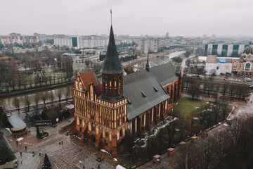 Medieval architecture of the European city of Konigsberg. Cathedral in Kaliningrad top view, aerial view,