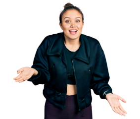 Young hispanic girl wearing sportswear smiling cheerful with open arms as friendly welcome, positive and confident greetings