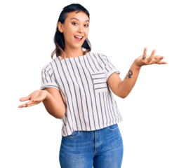 Young woman wearing casual clothes smiling cheerful offering hands giving assistance and acceptance.