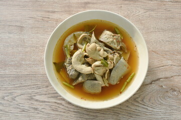 boiled hot and spicy soup with pork entrails on plate