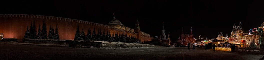 New Year's illumination of the red square. Christmas garlands on city lighting pylons. Ornaments...