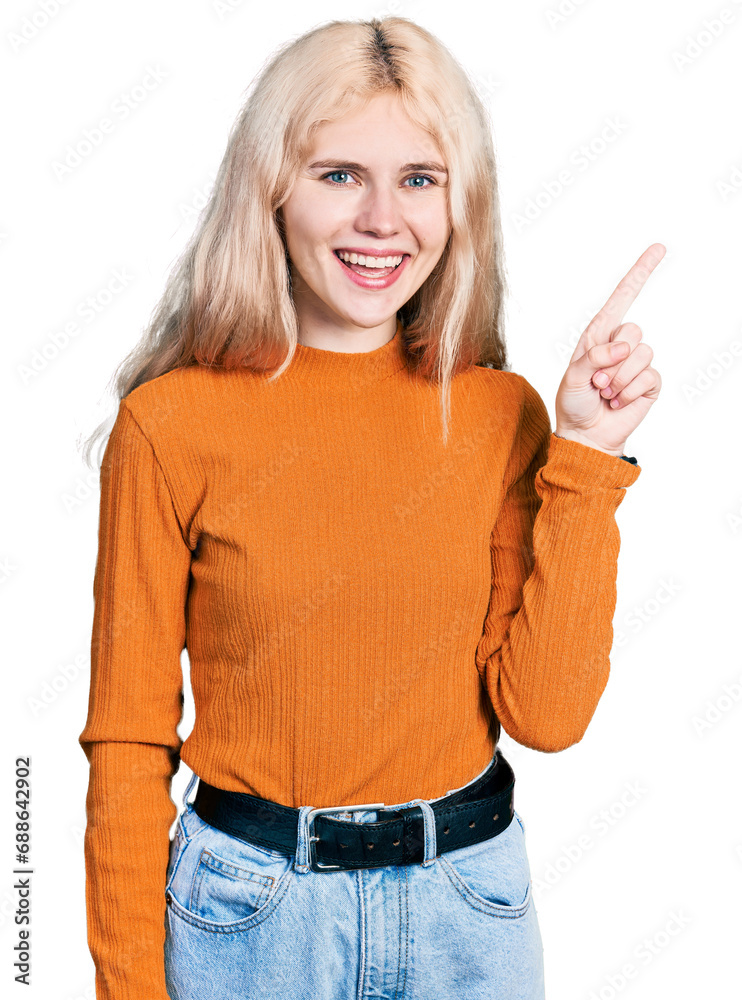 Sticker Young caucasian woman wearing casual clothes pointing finger up with successful idea. exited and happy. number one.