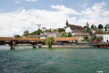 Fototapeta na wymiar The Spreuer Bridge (Spreuerbrücke) over the river Reuss in the medieval town center in the city of Lucerne, Switzerland