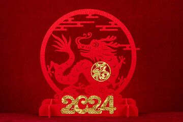 Chinese New Year of Dragon 2024 mascot paper cut on red background at horizontal English...