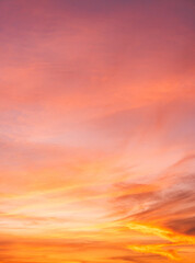 Sunset sky clouds vertical, Colorful sunrise sky with Orange, Pink, Yellow in the evening on Golden Hour Romantic sky background 